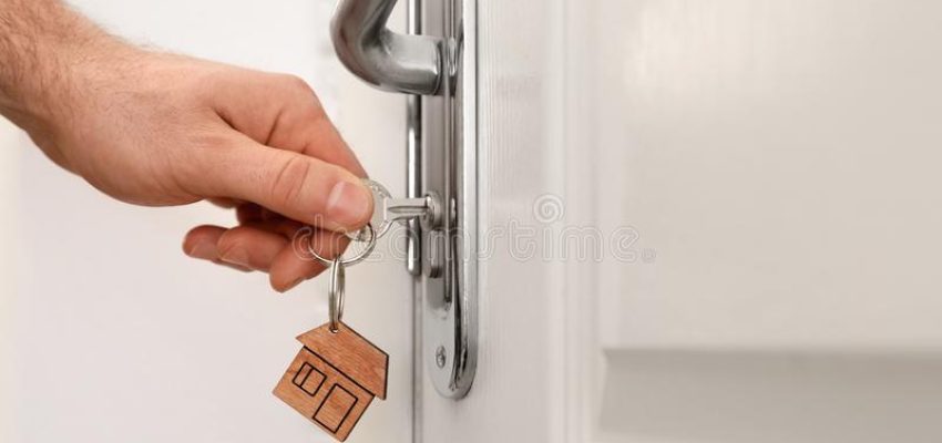 man-key-opening-front-door-closeup-space-text-141042380 (1)